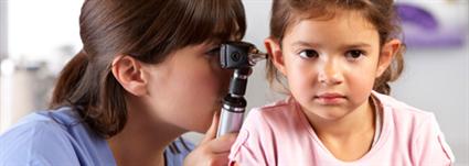 Nurse assessing student 